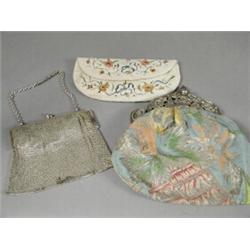 Two early 20th century continental silver metal mounted handbags, and an early 20th century beadw...