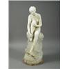 Image 1 : An Art Deco alabaster figure of a lady seated on a rock, indistinctly signed to back, 53cm Est. 5...