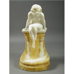 An Art Deco alabaster figure of a nude seated on a fountain, indistinctly signed to back, 43cm Es...