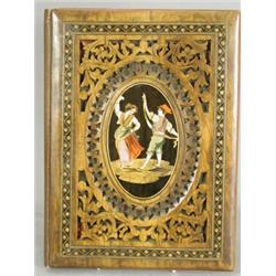 A Sorrento blotter with an inlaid panel within a fretwork border, the interior with stationery co...
