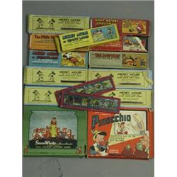 A collection of boxed sets of glass toy lantern slides, including Mickey Mouse and Pinocchio Est....