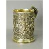Image 1 : A 19th century electro type tankard, with battle scenes and a branch and vine handle, 14cm high E...