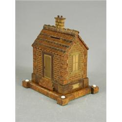 A good 19th century carved and inlaid wooden money box in the form of a cottage, 21cm high Est. 4...