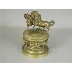 An unusual bronze inkwell surmounted by two horses, 24cm high Est. 200/300...