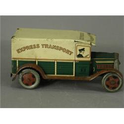 A tin plate and clockwork 'Express Transport' delivery van by Wells of London, (back doors missin...