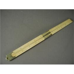 A 24 inch folding ivory rule by Davis & Sons, Derby Est. 100/150...