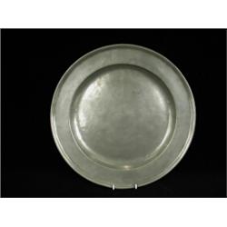 A late 18th century pewter charger with Tudor Rose touch marks, 37cm diameter Est. 100/150...
