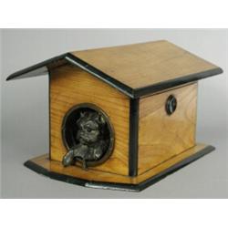 A 19th century novelty oak cigar box in the form of a dogs kennel, 16cm high Est. 300/400...