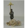 Image 1 : A bronze hat pin holder in the form of a chinaman holding a pagoda shaped umbrella, with two hat...