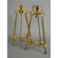 A pair of gilt metal easel photograph frames, 29.5cm Est. 100/150...