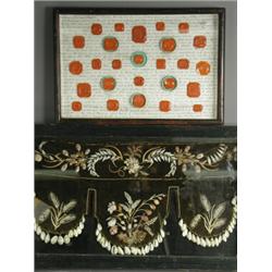 A European velvet and shell drape, housed in a frame, 27 x 53cm, and twenty six framed wax seal m...