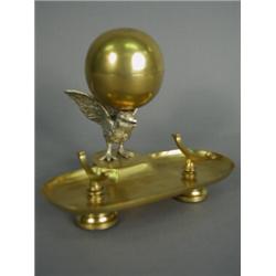 A 19th century ormolu desk stand with a white metal bird supporting a globe inkwell, 14cm Est. 12...