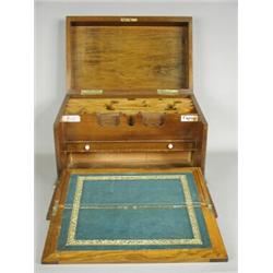 A Victorian writing box with a lift up top, fitted interior and fold out writing surface Est. 250...