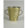 Image 1 : An Arts and Crafts brass ice bucket with two embossed bouquets of tulips on a hammered ground, c/...