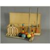 Image 1 : A table croquet set, with balls and hoops, box 30cm long Est. 100/150...