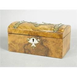 A mid Victorian figural walnut domed tea caddy, the foliate brass applied lid lifting to reveal l...