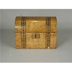 A Victorian walnut and Tunbridgeware tea caddy, the domed lid enclosing two lidded compartments,...