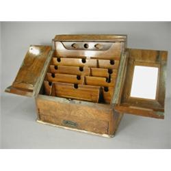 A Victorian walnut slope front stationery cabinet, with a pull out writing drawer, 37cm Est. 250/...