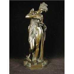 A 19th century bronze figure of a female nymph, standing and filling an oil lamp, inscribed 'A. C...