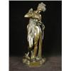 Image 1 : A 19th century bronze figure of a female nymph, standing and filling an oil lamp, inscribed 'A. C...