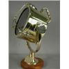 Image 1 : A brass ships search light on a wooden base, 50cm high Est. 200/300...
