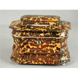 A 19th century sarcophagus shaped tortoiseshell tea caddy with white metal escutcheon and initial...