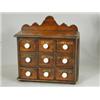 Image 1 : A 19th century spice chest with an arrangement of nine drawers, each named, with white bun handle...