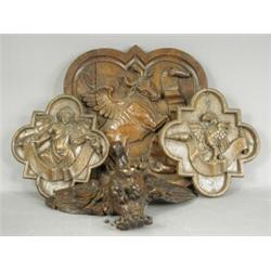 Three oak quatreform panels (two a pair) and a carved figure of an eagle, 39.5cm Est. 200/250...