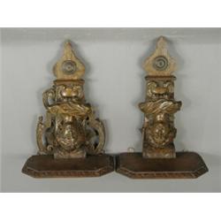 A pair of continental carved walnut caryatid wall brackets, 35cm high Est. 200/250...