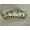 Image 1 : A Victorian five stone opal ring, set in 18ct gold, 1896, size L 1/2 Est. 80/120...