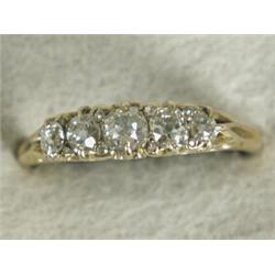 A five stone diamond engraved half hoop ring set with old cut stones, sizes Q 1/2 Est. 300/400...