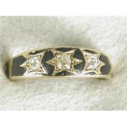 A Victorian 18ct gold three stone diamond mourning gypsy ring with enamelled decoration (worn), s...