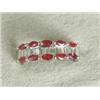 Image 1 : A ruby and diamond dress ring set with ten marquise rubies and fourteen diamonds, set in 18ct whi...