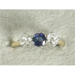 A sapphire and diamond three stone ring set in 18ct gold and platinum, size M Est. 350/400...