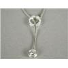 Image 1 : A diamond pendant of modern design set in 18ct white, consisting of a circle of single cut stones...