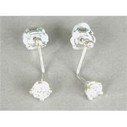 A pair of diamond solitaire drop earrings (each approx. 0.50ct), set in white metal (tests gold)...