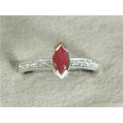 A marquise ruby ring with diamond set mounts and shoulders, set in 18ct gold, size P Est. 150/200...