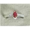 Image 1 : A marquise ruby ring with diamond set mounts and shoulders, set in 18ct gold, size P Est. 150/200...