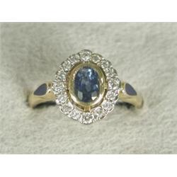 A Royal Doulton 14ct gold sapphire and diamond cluster ring with dark blue enamel set shoulders,...