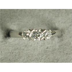 A Mappin & Webb three stone diamond ring set in platinum (total diamond weight 0.50ct), size K, (...