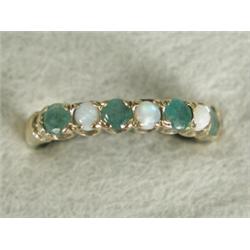 An emerald and opal half eternity ring set in 9ct gold, size L 1/2 Est. 100/150...