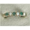 Image 1 : An emerald and opal half eternity ring set in 9ct gold, size L 1/2 Est. 100/150...