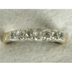 A seven stone diamond ring set with old cut stones, size L Est. 300/400...