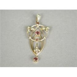 A 9ct gold Art Nouveau pendant, set with seed pearls and pink stones, 5cm long Est. 80/120...