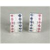 Image 1 : A pair of diamond, sapphire and ruby earrings in 18ct white gold stud mounts Est. 300/400...