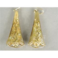 A pair of yellow metal earrings with foliate decoration, 4.5cm long Est. 100/150...