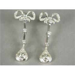 A pair of diamond set drop earrings, 4.5cm long Est. 400/500...