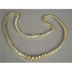A diamond necklace set with approx 3cts of diamonds, set in 14ct gold, 38cm long Est. 900/1000...