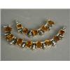 Image 1 : Part of a citrine and diamond necklace Est. 100/150...