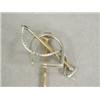Image 1 : A gold hunting tie pin in the form of a stirrup and a whip, 8cm long Est. 80/120...